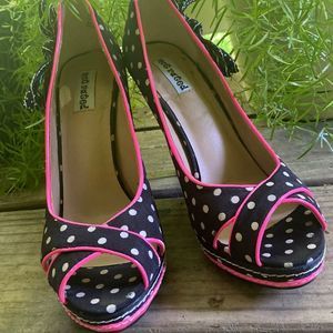 Not rated pink and black heels